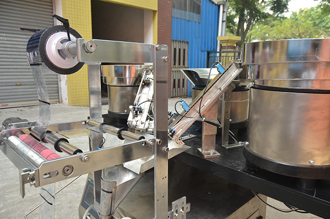 多物料自動包裝機裝膜系統機器結構配件